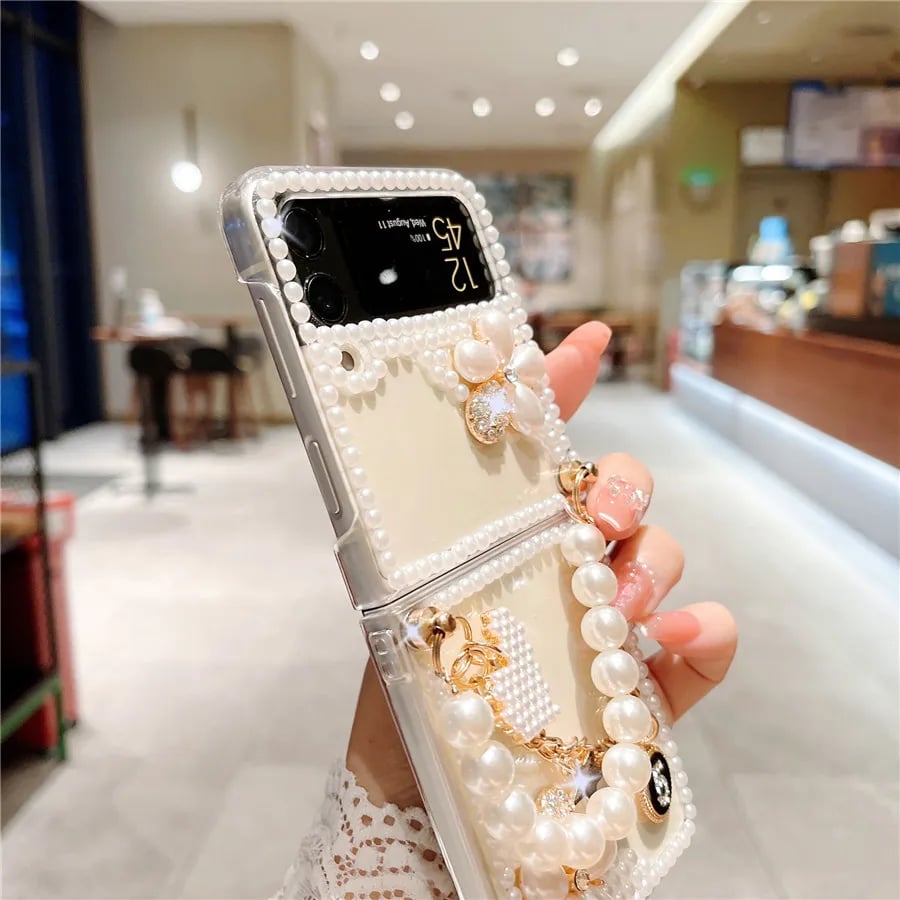 Glitter Rhinestone Flower and Luxury Pearl Flower Phone Case for Galaxy Z Flip 3/Galaxy Z Flip 4/Galaxy Z Flip 5/Galaxy Z Flip 6 with Bracelet