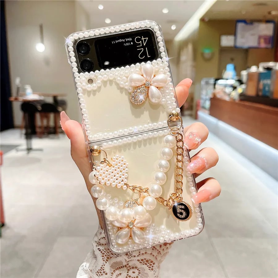Glitter Rhinestone Flower and Luxury Pearl Flower Phone Case for Galaxy Z Flip 3/Galaxy Z Flip 4/Galaxy Z Flip 5/Galaxy Z Flip 6 with Bracelet