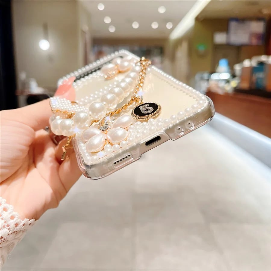 Glitter Rhinestone Flower and Luxury Pearl Flower Phone Case for Galaxy Z Flip 3/Galaxy Z Flip 4/Galaxy Z Flip 5/Galaxy Z Flip 6 with Bracelet